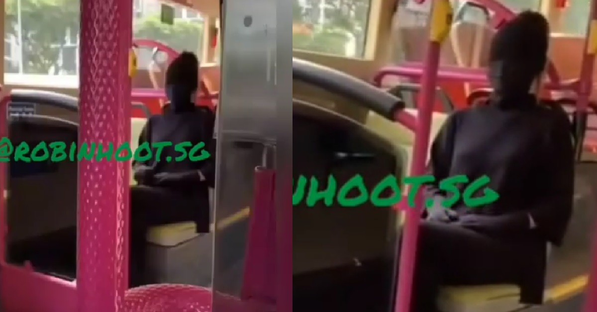 WOMAN WRAP HERSELF FULLY IN BLACK TO PLAY HIDE & SEEK WITH THE VIRUS