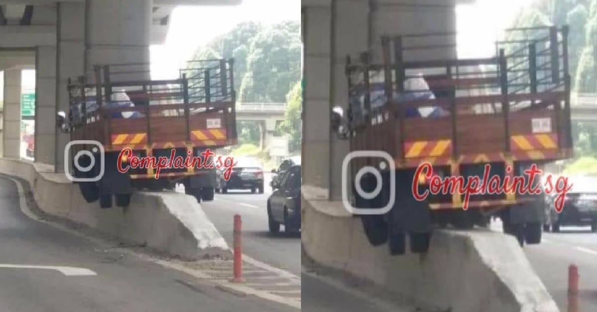 LORRY TIRED FROM DRIVING, SO TAKE A QUICK REST ON ROAD DIVIDER