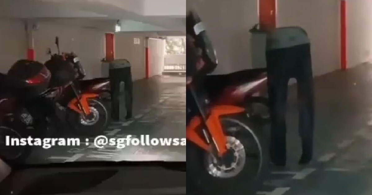 “FIGURE” WITH NO UPPER BODY SEEN STANDING AT MULTI STOREY CARPARK