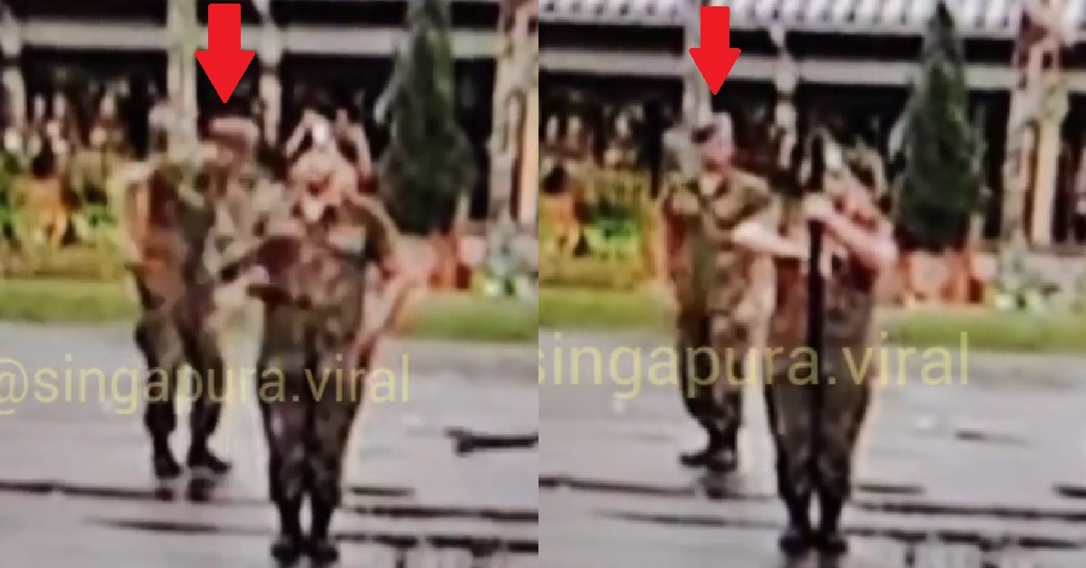 SOLDIER PERFORM RIFLE DRILL,  SPIN RIFLE UNTIL IT FLY AWAY THEN HE BECOME LOST