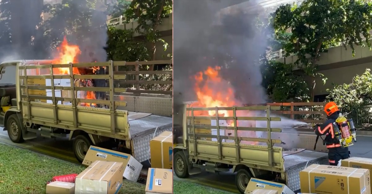 LORRY CATCHES FIRE ALONG KEPPEL ROAD, NO ONE STOP TO HELP