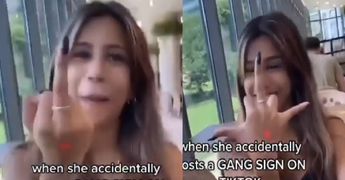 GIRL FLASH GANG SIGN TO PLEDGE HER LOYALTY TO THE SALAKAU GANG