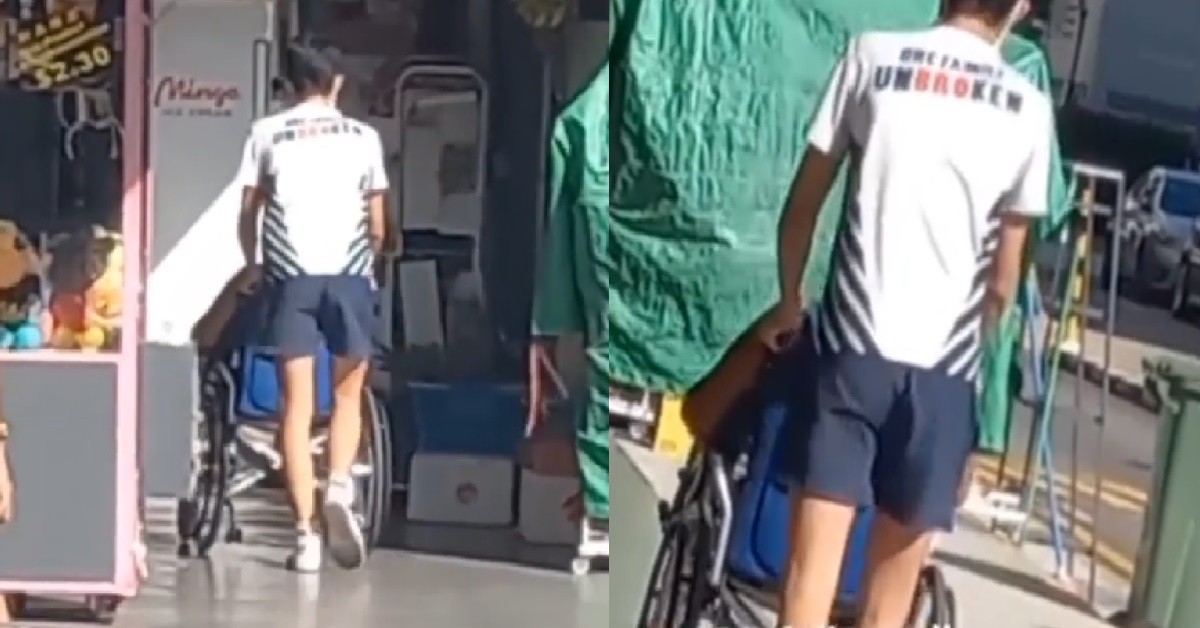 KIND STUDENT FROM ST ANDREW HELPED PUSH HANDICAPPED AH MA ON WHEELCHAIR