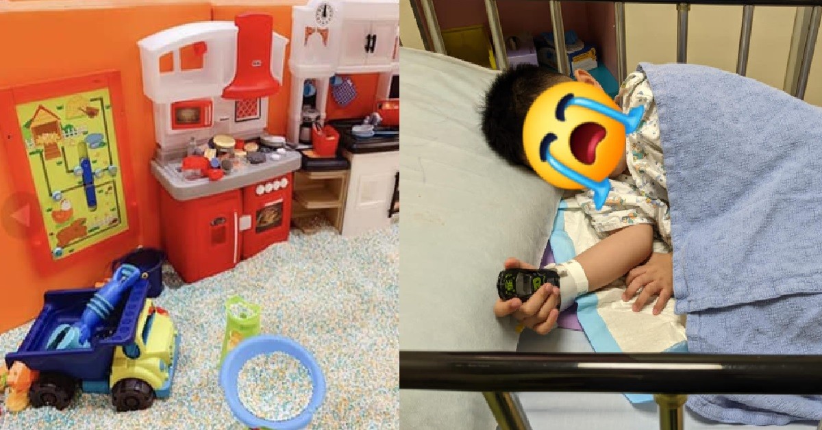 BOY PLAYING AT PLAYGROUND WITH PEBBLES, PEBBLE STUCK INSIDE HIS EAR