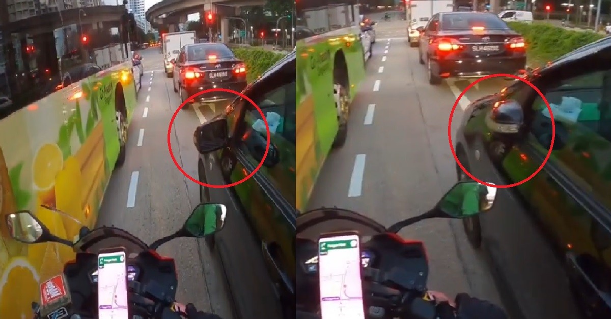 GRACIOUS DRIVER FOLDS SIDE MIRROR TO LET MOTORCYCLIST SQUEEZE THROUGH