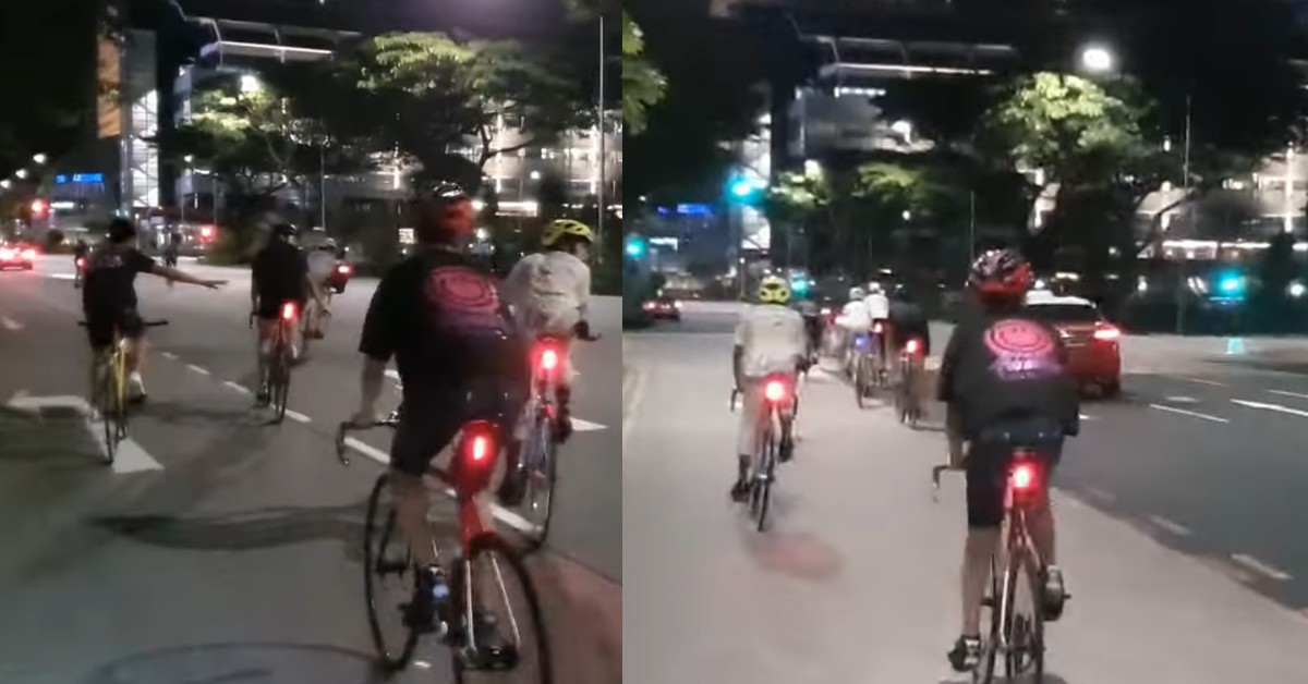 AROUND 10 CYCLIST GATHERS IN MIDDLE OF ROAD NEAR SUNTEC