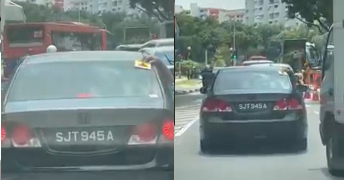 GUY FORGOT PUT P-PLATE, ASK  FRIEND HOLD IT WHILE DRIVING