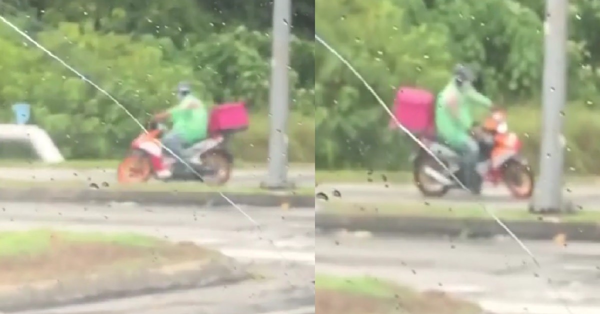 MOTORCYCLIST RIDING IN CIRCLES WAITING FOR TRAFFIC LIGHT IN M’SIA