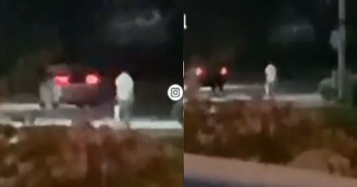 MAN WALKING ON EXPRESSWAY LIKE A BOSS IN THE MIDDLE OF THE NIGHT