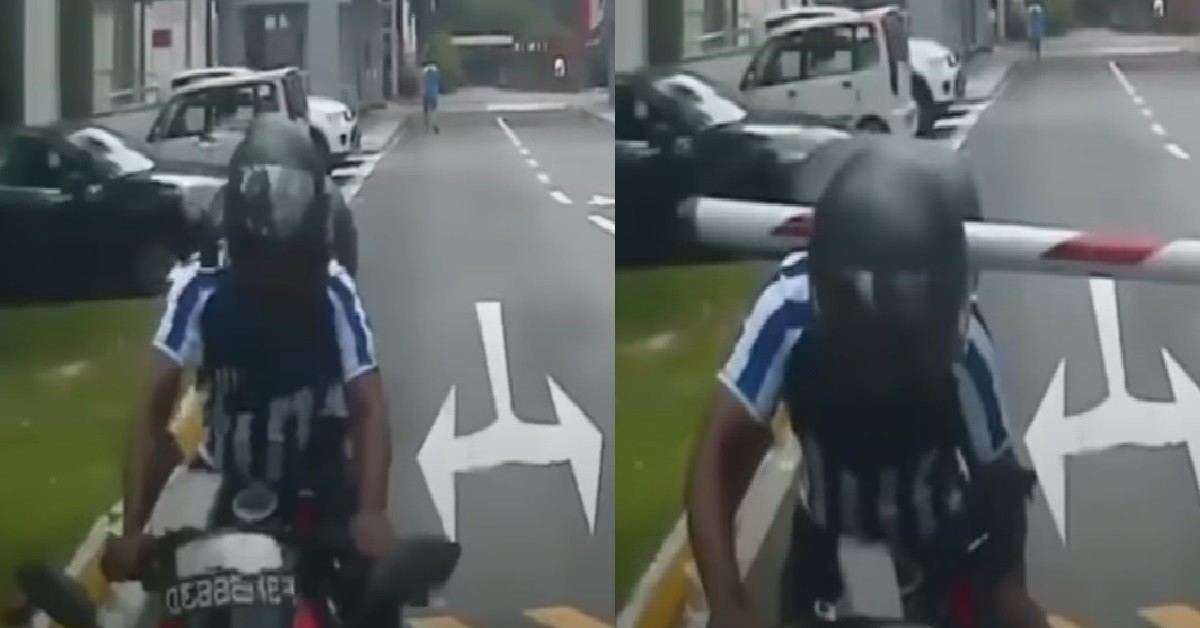 MOTORCYCLIST TAILGATE CAR OUT OF CARPARK, SMACKED BY GANTRY TO WAKE UP HIS IDEA