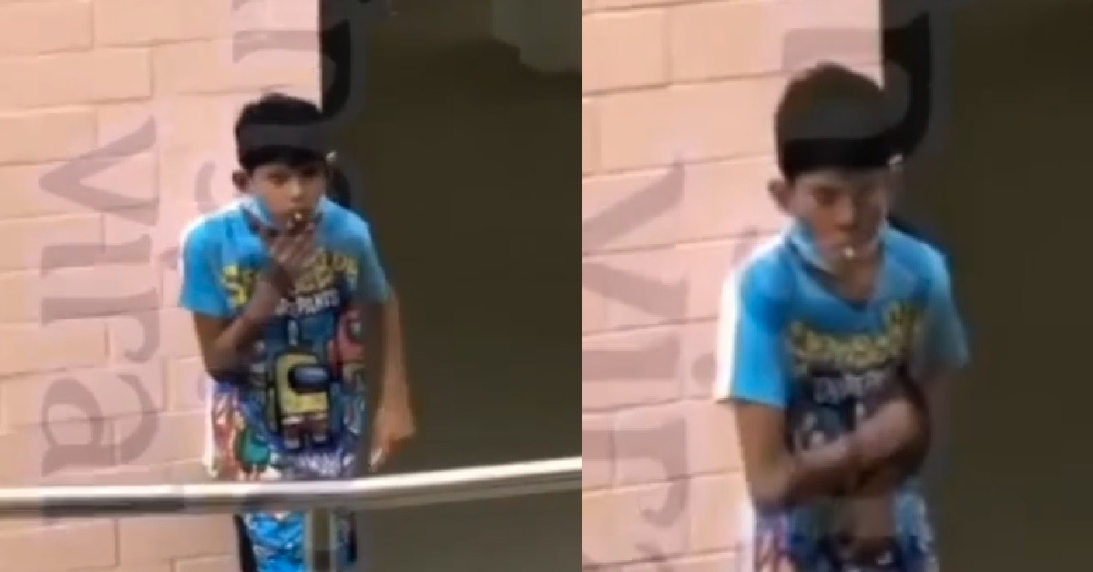 BOY SEEN ILLEGALLY SMOKING IN PUBLIC UNDER HDB BLOCK LIKE A BOSS