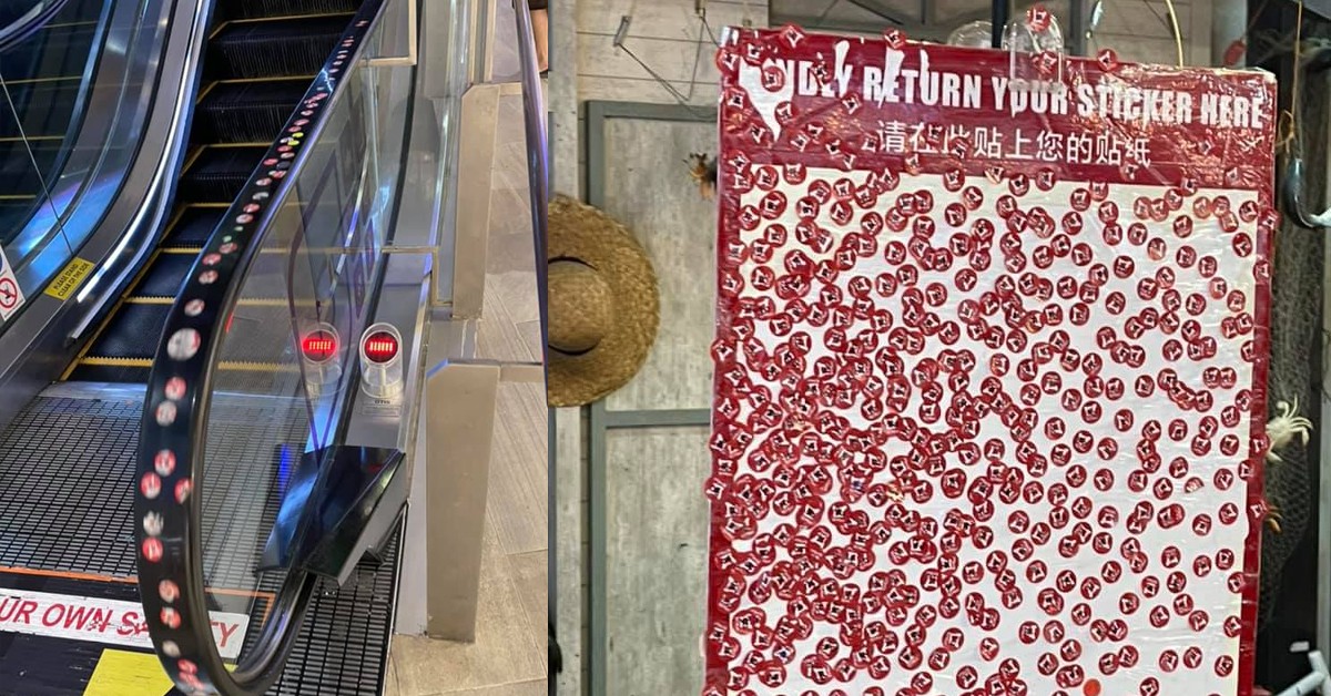 SHOPPERS PASTE STICKERS ALL OVER WATERWAY POINT ESCALATOR
