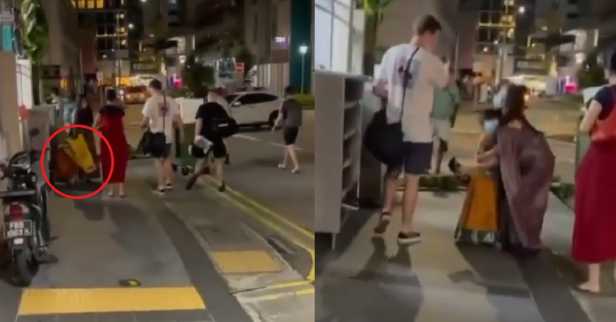 CRAZY GUY THROWS SIGNAGE AT CHILD THEN RUN AWAY