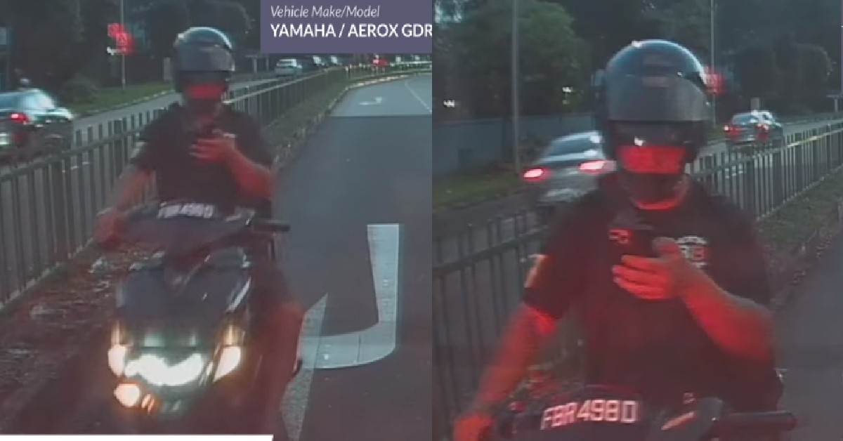 CHAMPION MOTORCYCLIST USING PHONE AND RIDING AT THE SAME TIME