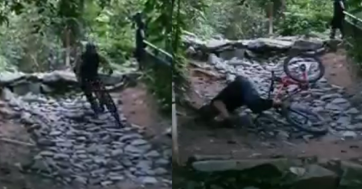 CYCLIST TRY TO RIDE DOWN SLOPE OF ROCKS, CRASHED AND HIT HIS HEAD