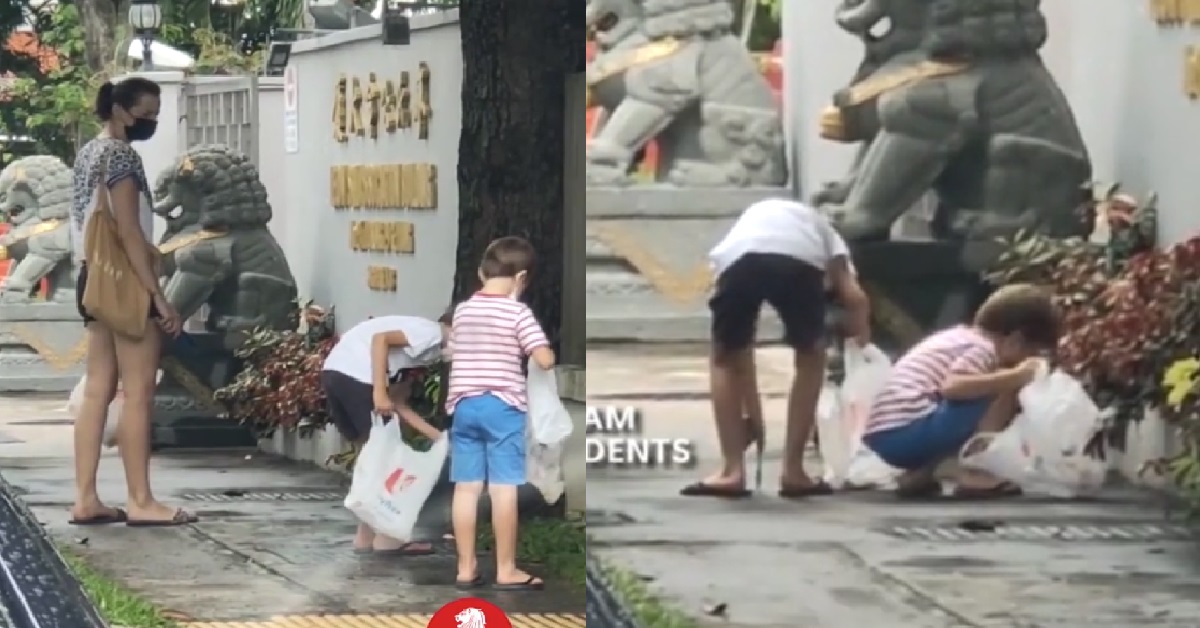 WOMAN BRINGS HER CHILDREN OUT TO PICK UP LITTER ON THE STREETS