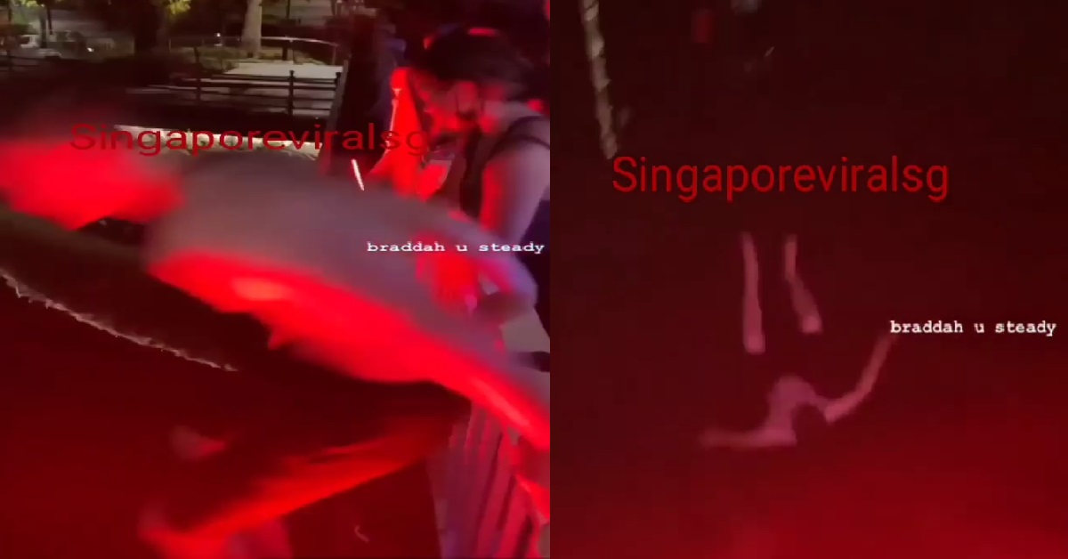 YOUTH JUMPS INTO S’PORE RIVER TO CHEERS FROM HIS FRIENDS