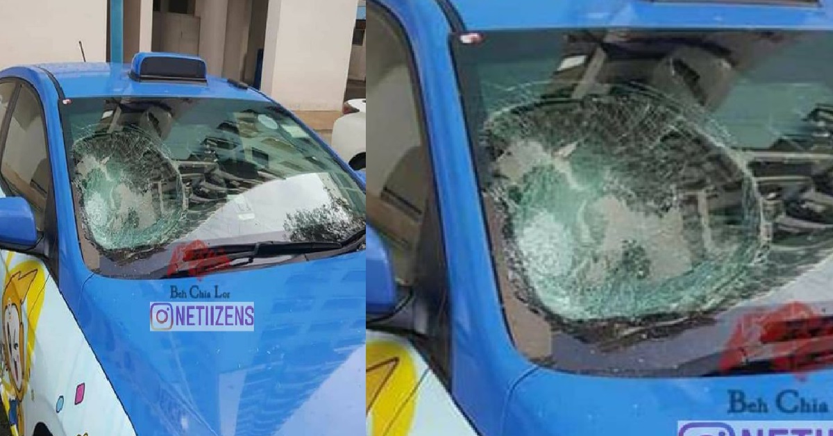 TAXI WINDSHIELD SMASHED AFTER SOMEONE THREW HEAVY OBJECT DOWN HDB