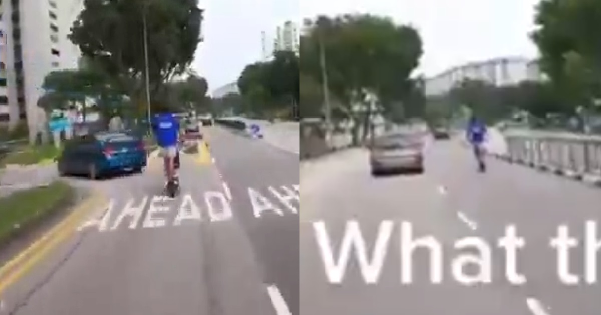 YP CHIONG HIS E-SCOOTER IN MIDDLE OF ROAD WITH NO HELMET