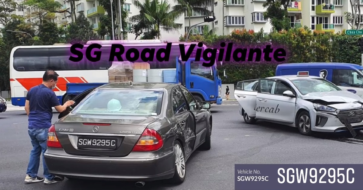 MERCEDES BEATS RED LIGHT THEN GETS HIT BY TAXI AT TRAFFIC JUNCTION