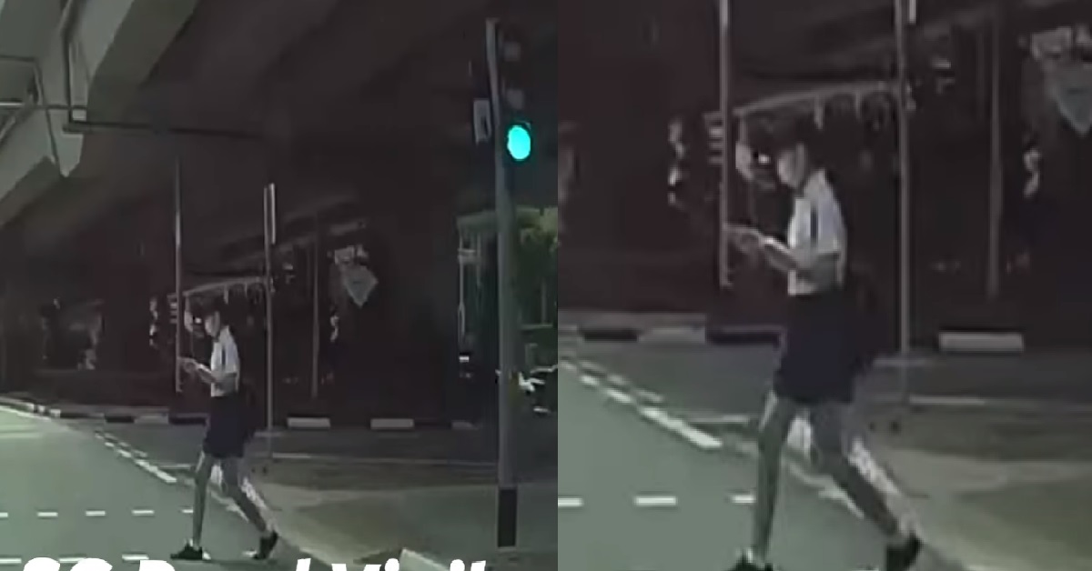 GIRL JAYWALKING AND LOOKING AT PHONE, ALMOST SENT TO THE NETHERWORLD
