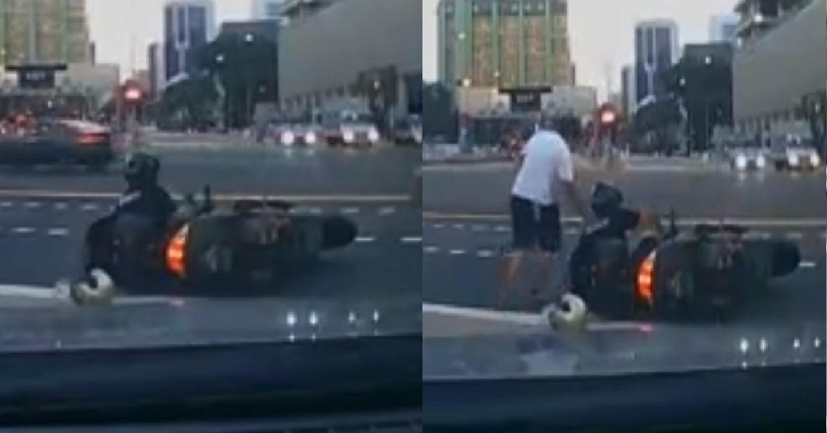 KIND DRIVER STOPS CAR TO HELP RIDER WHO HAD FALLEN OFF HIS MOTORCYCLE