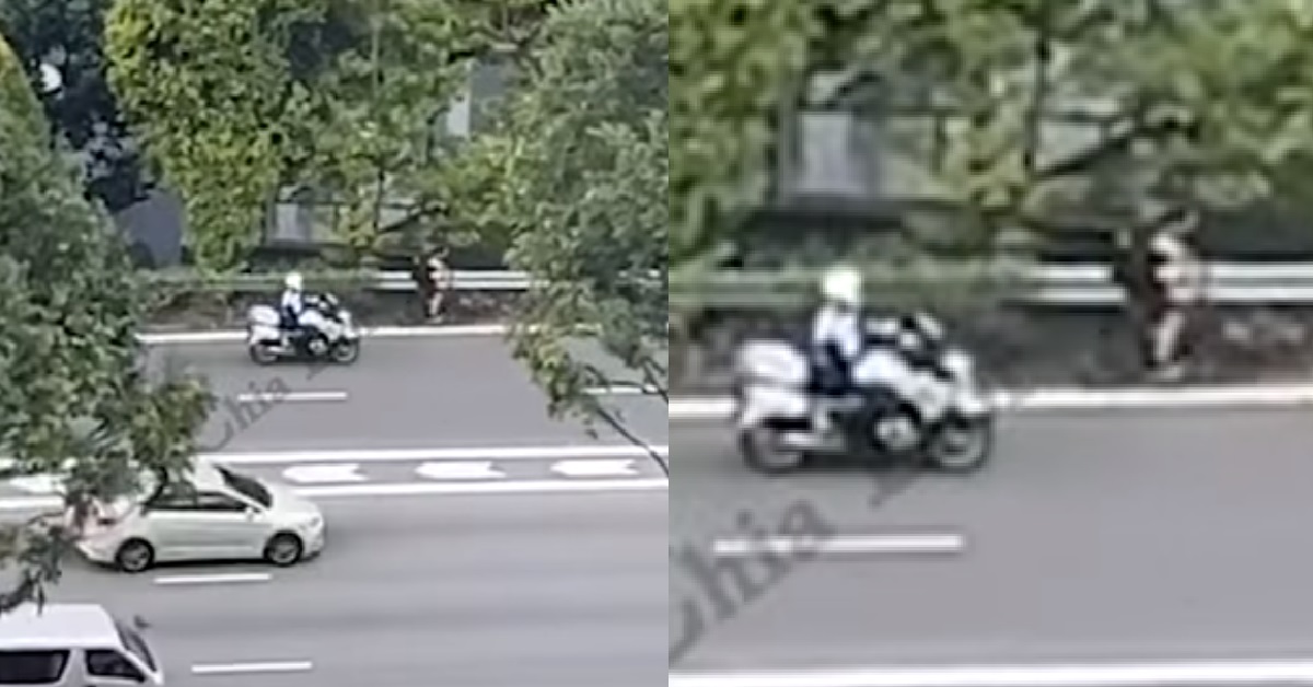 ERRANT CYCLIST ON EXPRESSWAY CAUGHT & STOPPED BY TRAFFIC POLICE OFFICER