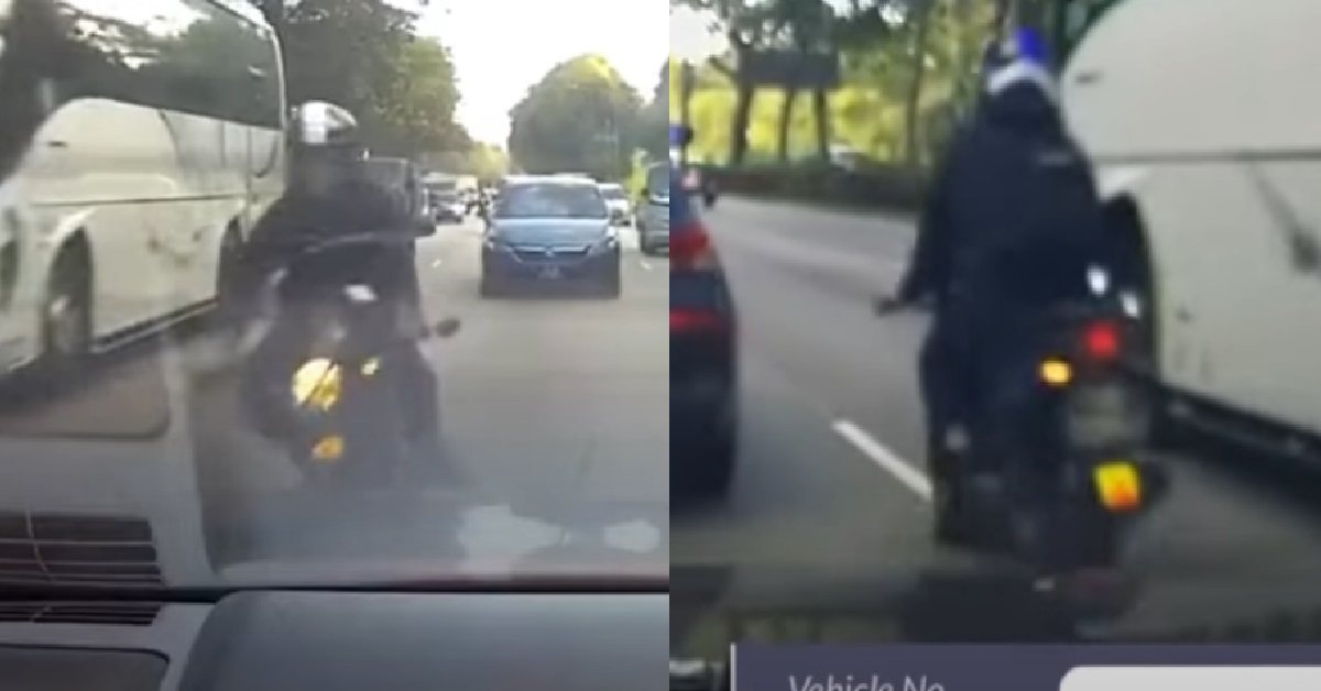 MOTORCYCLIST LOSES BALANCE AND HITS CAR ON BKE, THEN RIDES AWAY