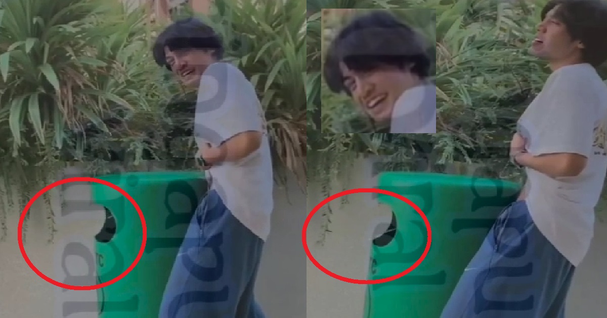 GUY ILLEGALLY URINATING INSIDE RUBBISH BIN AND SMILING FOR THE CAMERA