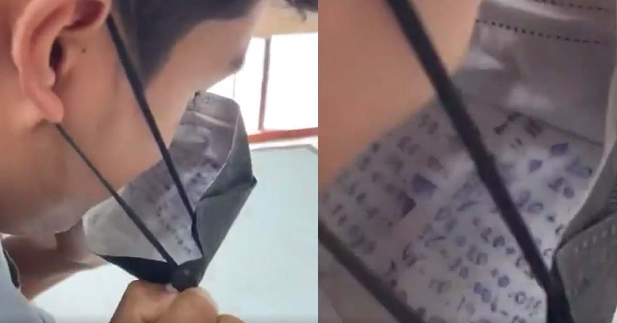 GUY SHOWS HOW HE COPY ANSWERS FROM MASK DURING THE EXAM