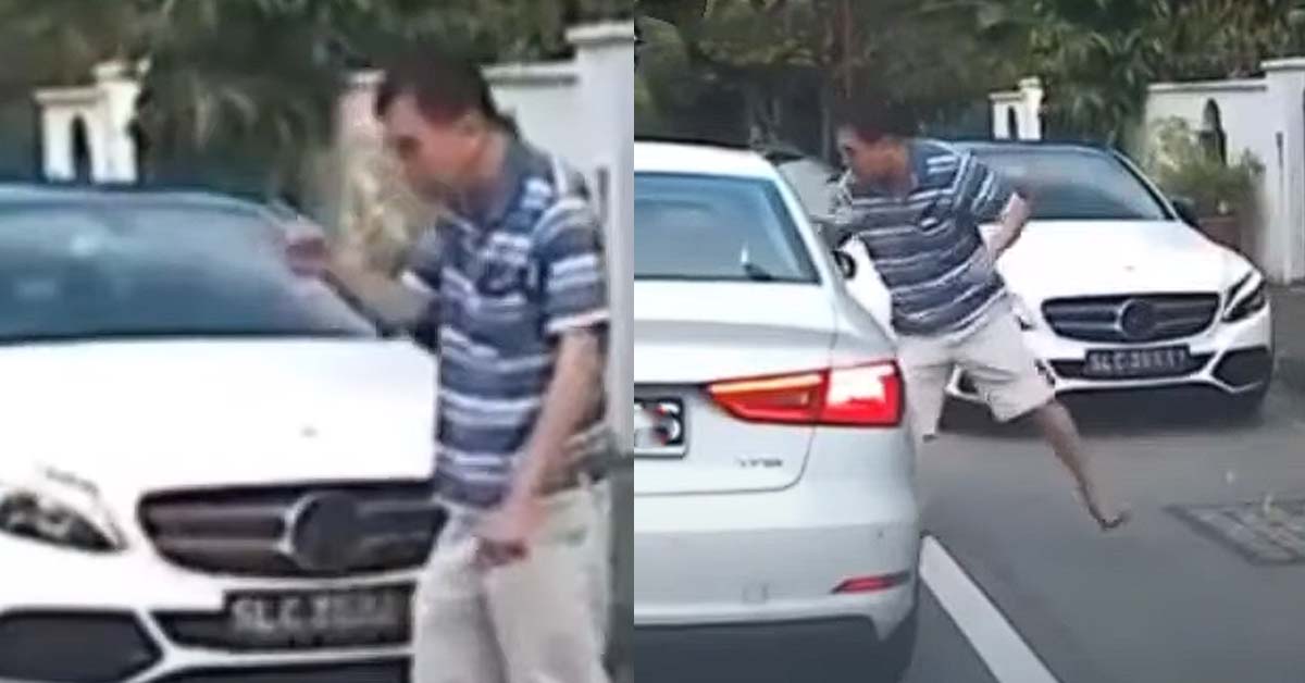 RAGING MAN PUNCHED AUDI DRIVER AT KOVAN