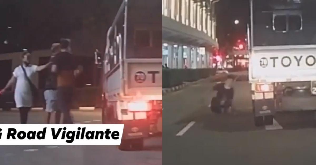 GROUP GETS HORN BY LORRY NOT HAPPY, TRY TO THROW CIGARETTE AND SPIT INSIDE