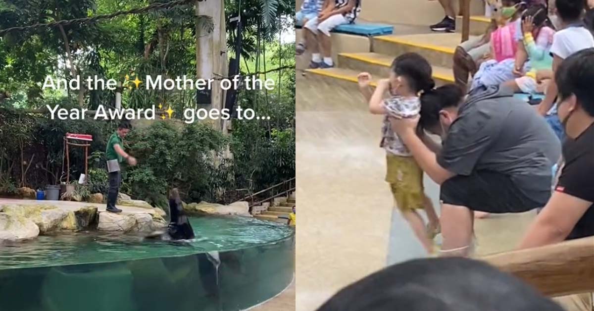 MOTHER USE CHILD AS “SHIELD” FROM WATER SPLASH AT ZOO