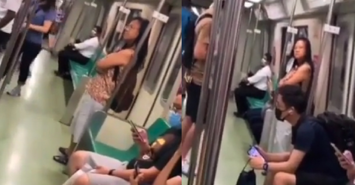 WOMAN GOES AROUND MRT LECTURING COMMUTERS WHILE NOT WEARING A MASK