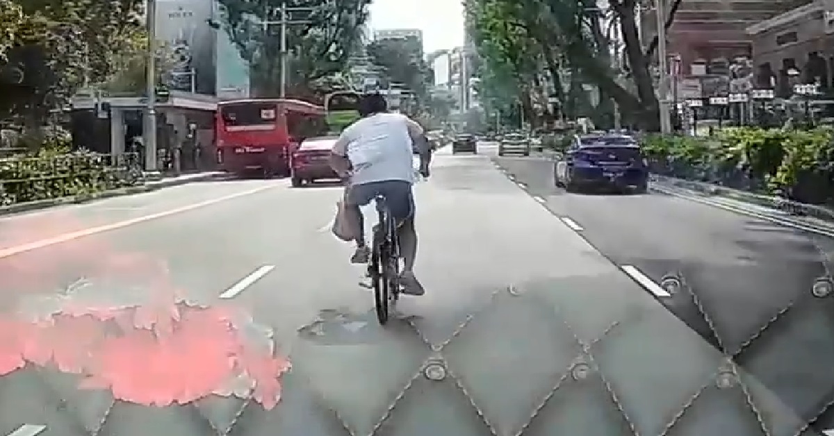 YET ANOTHER ERRANT CYCLIST RIDING IN THE MIDDLE OF THE ROAD @ ORCHARD