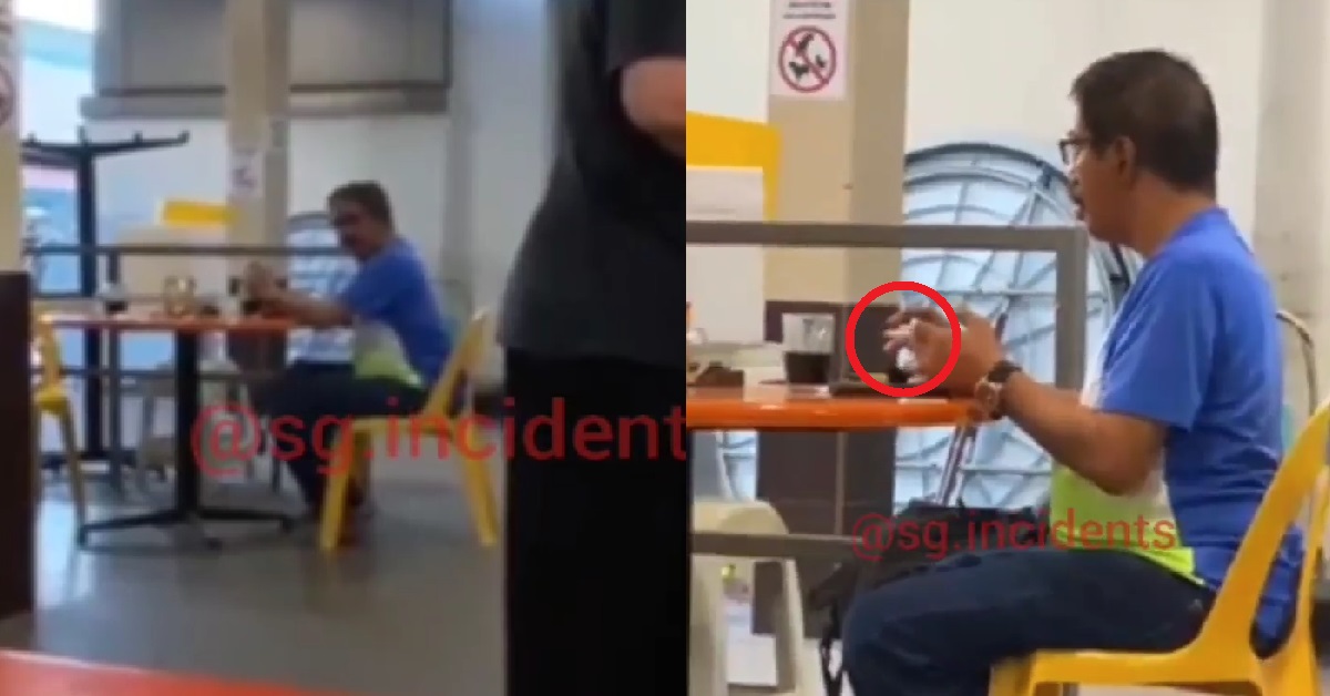 UNCLE SEEN HAPPILY SMOKING INSIDE COFFEESHOP WHILE HE LIM HIS KOPI