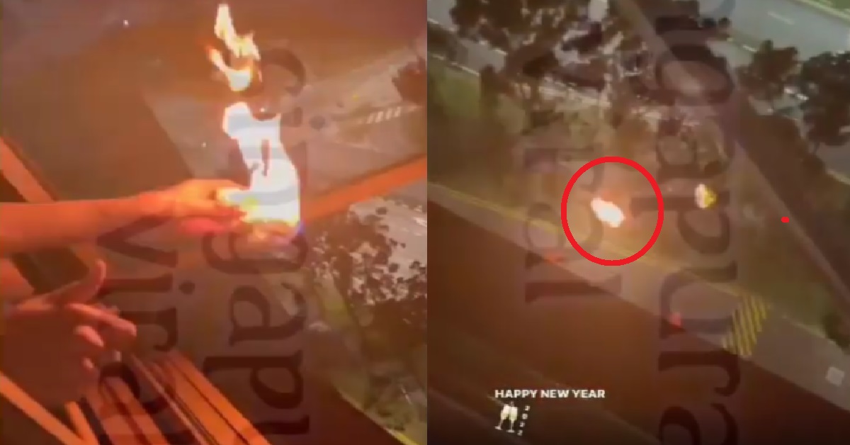 YP SETS PAPER ON FIRE THEN THROWS IT DOWN HIGH RISE HDB BUILDING