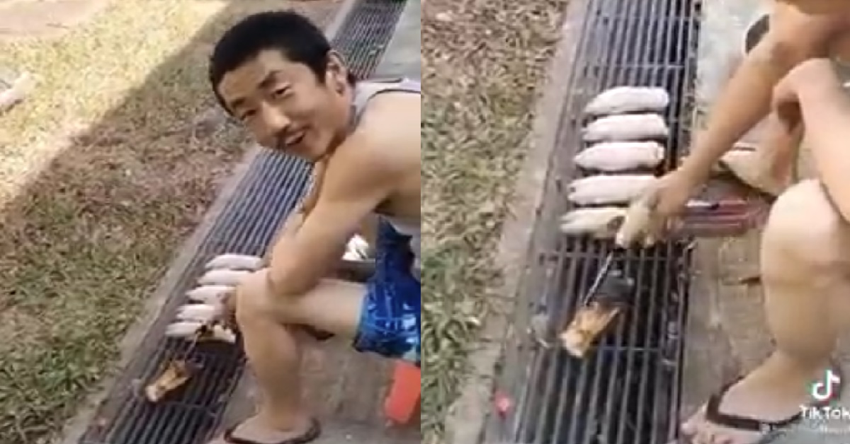 MAN GRILLING PORK TROTTERS ON LONGKANG @ MACPHERSON LANE