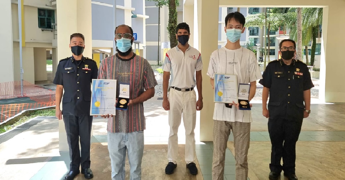 RESIDENTS EVACUATED NEIGHBOURS DURING FIRE, AWARDED BY SCDF
