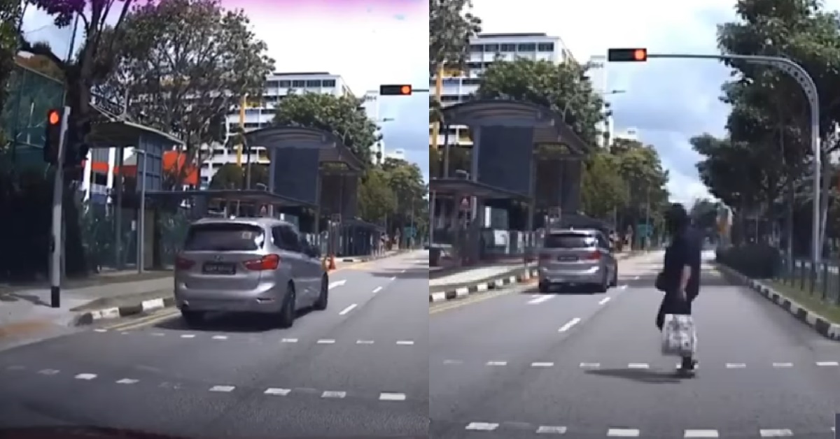 BMW BEATS RED LIGHT IN FRONT OF PEDESTRIAN CROSSING THE ROAD
