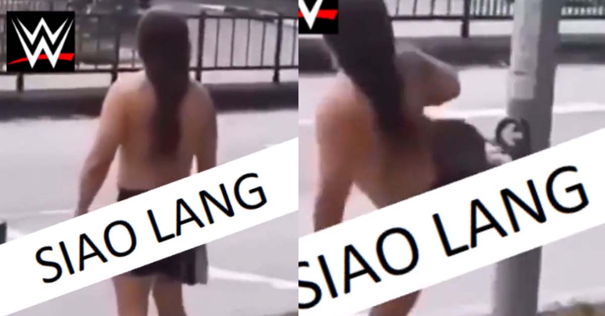MAN WITHOUT SHIRT KICKS TRAFFIC LIGHT BUTTON LIKE WWE SUPERSTAR