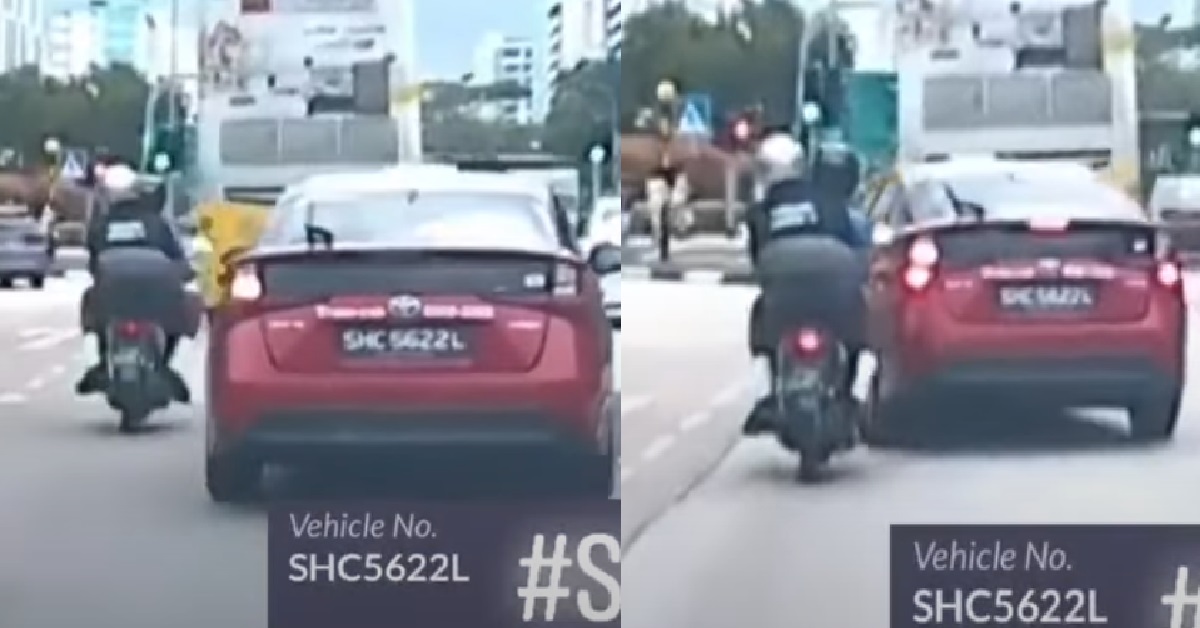 HOOLIGAN TAXI DRIVER CUTS OFF MOTORCYCLIST RECKLESSLY