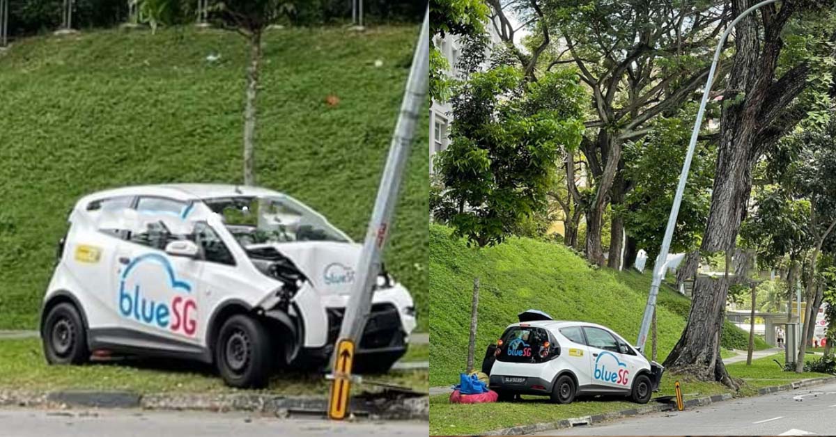 BLUE SG CAR CRASHES INTO LAMPPOST, LAMP POST TILTED ONTO TREE
