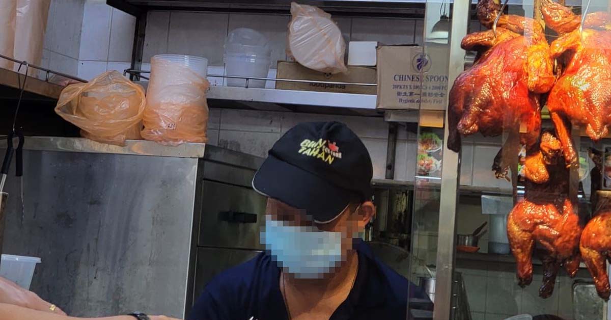 MAN WEARING “BUEY TAHAN SEE-FOOD” CAP AT NON-HALAL STALL IS NOT THEIR STAFF