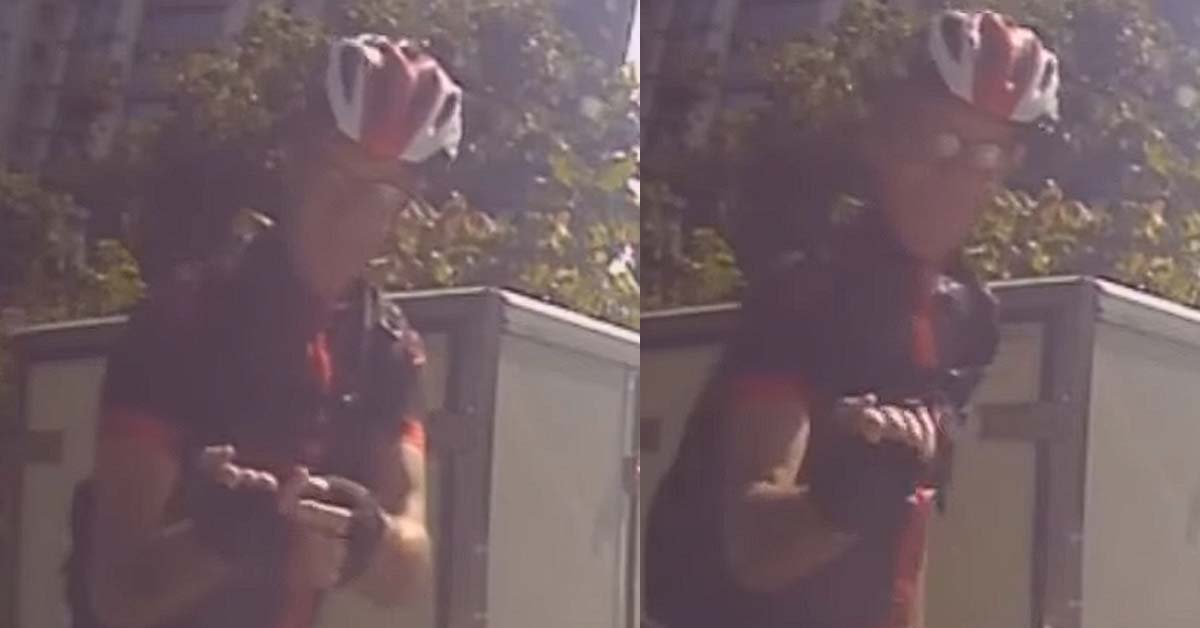 MAN CYCLES IN THE MIDDLE OF THE ROAD, SPRAYS WATER & SHOW RUDE GESTURE