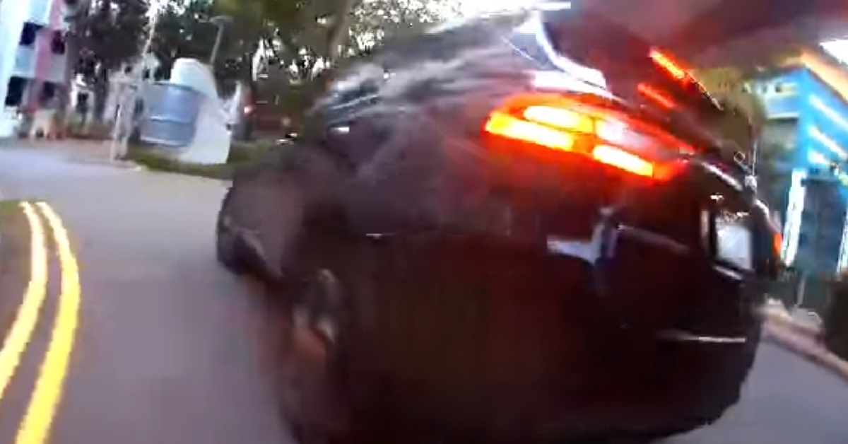 DRIVER DANGEROUSLY CUTS OFF CYCLIST ON SIDE OF ROAD ON PURPOSE
