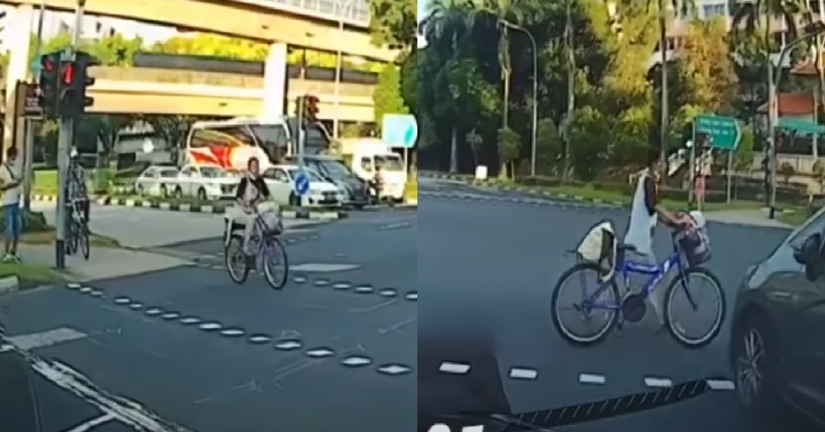 CYCLIST JAYWALKS ACROSS ROAD BECAUSE THE LAW HER AH GONG WRITE ONE