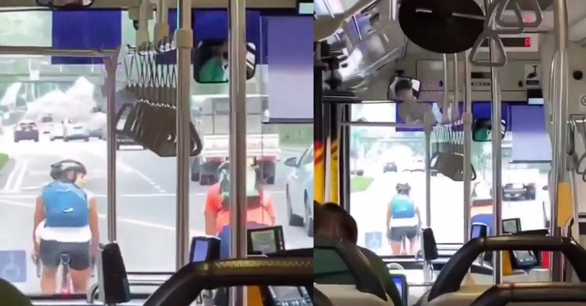 TOUR DE FRANCE CYCLIST TAKING THEIR OWN SWEET TIME BLOCKING BUS