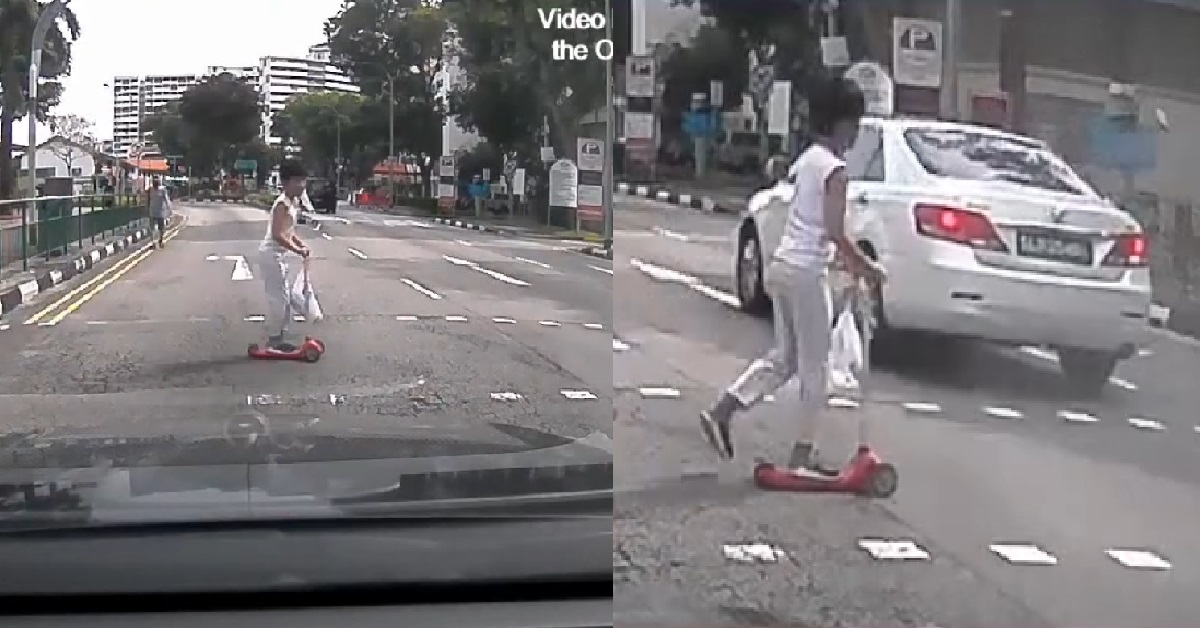DRIVER BEATS RED LIGHT THEN ALMOST RUNS OVER YOUNG BOY ON KICK-SCOOTER