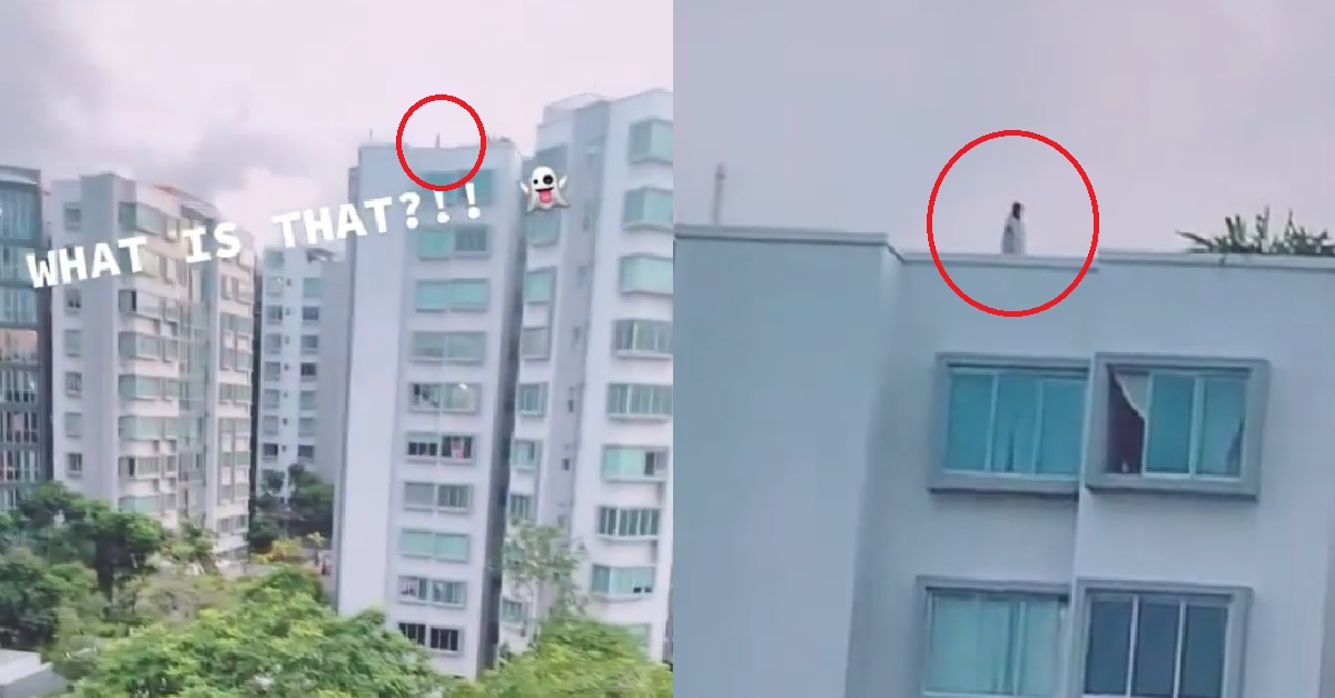 WOMAN (OR PONTIANAK) SEEN STANDING ALONE ON TOP OF CONDO ROOFTOP